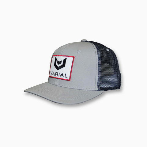 Varial surf technology surf brand clothing. Grey trucker hat with varials signature logo.